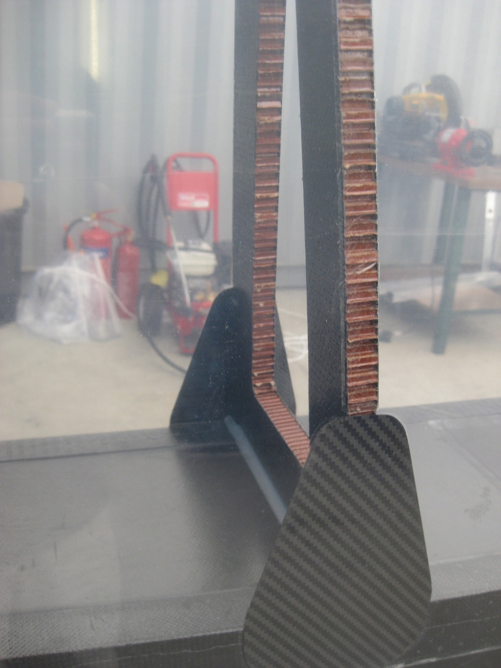 Kevlar & Carbon make the honeycomb structure refered to as the ribs of the sail. Honeycomb Structure