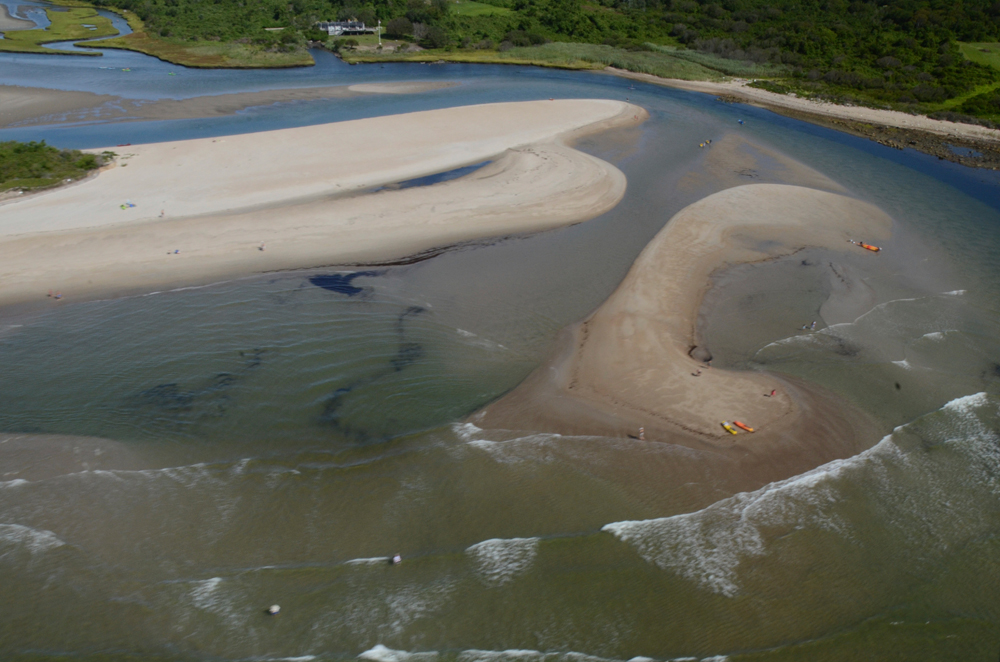 The mouth of the narrow river, in Narragansett, RI is no stranger to shifting sands. The Nature Conservancy along with the Department of Environmental Management and the U.S. Fish and Wildlife Service used natural materials to install the state’s first living shoreline to prevent marsh erosion. Photo credit: RI Sea Grant Narrow River, Rhode Island, Erosion