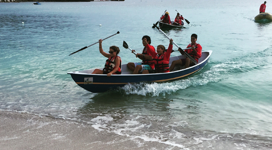 Local students from the Kidz at Sea program showed off the boats they built and their rowing skills during an informational session about youth opportunities to be involved in sailing at the Caribbean Sailing Association conference. Kidz at Sea, Kids at Sea, kids rowing, caribbean