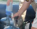 Dolphin pump on 5-gallon jug placed on race committee boat. Dolphin pump on 5-gallon jug placed on race committee boat.