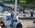 Regatta organizers made an announcement during the skipper's meeting to let everyone know that they were competing in a Sailors for the Sea registered Clean Regatta and how they could help keep the event green! You can also see bike racks in the top left corner that the club has added to encourage sailors to ride their bike to regattas. skipper's meeting, clean regattas announcement, bike rack