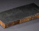 A piece of the material used for the ribs of the sail. Honeycomb Cutout
