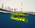 Great things come in small packages! The wave glider is prior to being fully launched compresses into a small, tight package. After it is placed in the water, the submersible glider is released to hang below the surface float. Photo credit: Liquid Robotics Liquid Robotics, Seagoing Robot, Wave Glider, Water Robot, Ocean Robot, Fishery Monitoring
